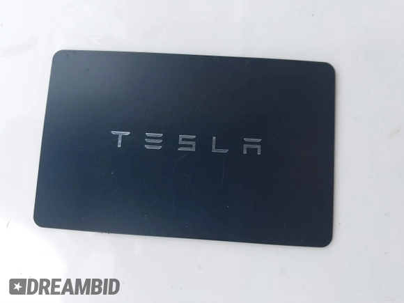 2023 Tesla Model Y Long Range with VIN 7SAYGDEE4PF789102, listed as a IAAI auction lot 41788860 with 88,457 mi miles and . Bid and sale history available at DreamBid. Image 11.
