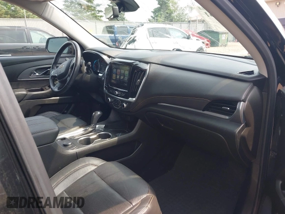 2019 Chevrolet Traverse Premier with VIN 1GNEVKKW1KJ282531, listed as a IAAI auction lot 42408361 with 95,464 mi miles and . Bid and sale history available at DreamBid. Image 5.