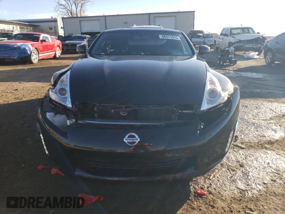 2014 Nissan 370Z Nismo z VIN JN1AZ4EHXEM632166, wystawiony jako Copart lot #88311915 z przebiegiem 18 414 mil mil oraz Szkoda całkowita • Salvage title. Historia ofert i sprzedaży dostępna na DreamBid. Obrazek 5.