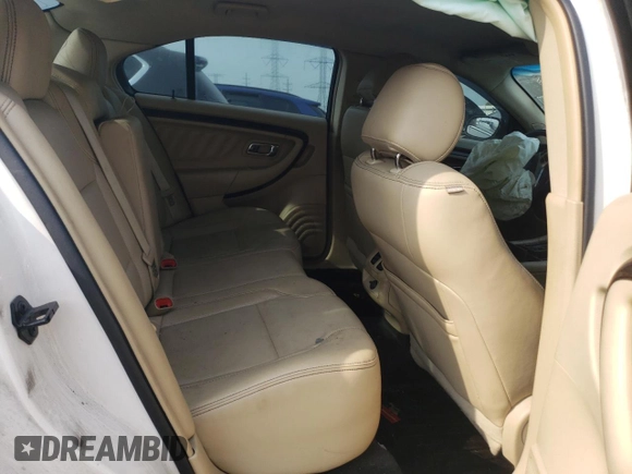 2016 Ford Taurus Limited with VIN 1FAHP2F8XGG124551, listed as a Copart auction lot 60621695 with 103,668 mi miles and Salvage title. Bid and sale history available at DreamBid. Image 10.