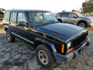 2001 Jeep Cherokee Sport with VIN 1J4FT48S51L568981, listed as a Copart auction lot 82471104 with 181,870 mi miles and Salvage Title. Bid and sale history available at carsss.com. Image 4.