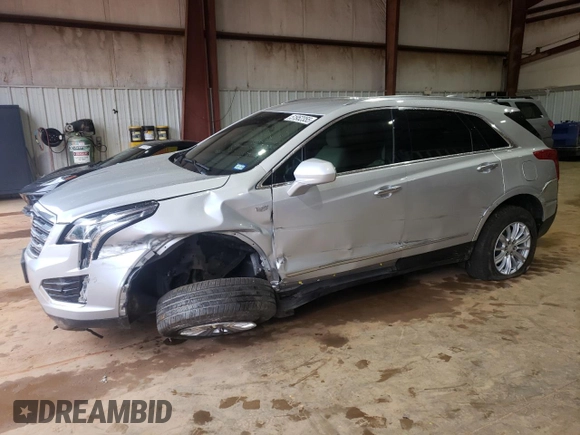 2019 Cadillac XT5 FWD with VIN 1GYKNARS1KZ231504, listed as a Copart auction lot 51952355 with 54,243 mi miles and Salvage title. Bid and sale history available at DreamBid. Image 1.