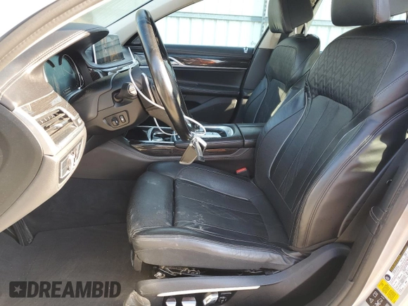 2016 BMW 7 Series 750i xDrive с VIN WBA7F2C58GG419163, выставлен на аукционе Copart как лот 52429835 с пробегом 93 025 миль миль и Списание • Salvage title. История ставок и продаж доступна на DreamBid. Изображение 7.