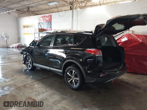 2018 Toyota RAV4 XLE with VIN 2T3WFREV1JW471931, listed as a IAAI auction lot 41332851 with 123,657 mi miles. Bid and sale history available at carsss.com. Image 3.