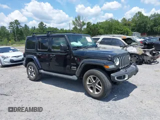 2021 Jeep Wrangler Unlimited Sahara with VIN 1C4HJXEN9MW681422, listed as a IAAI auction lot 42563426 with 48,582 mi miles and . Bid and sale history available at DreamBid. Image 1.