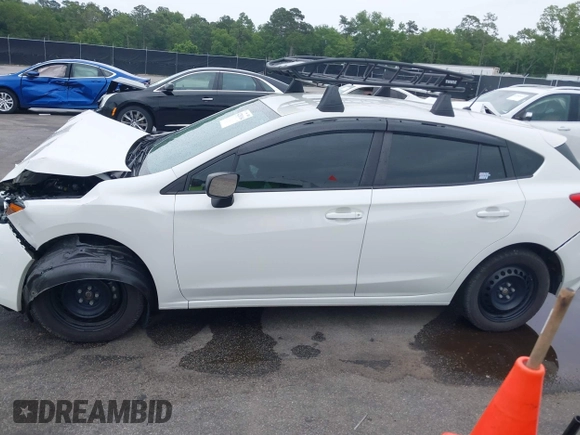 2023 Subaru Impreza with VIN 4S3GTAB6XP3706463, listed as a IAAI auction lot 42201164 with 71,572 mi miles and . Bid and sale history available at DreamBid. Image 14.