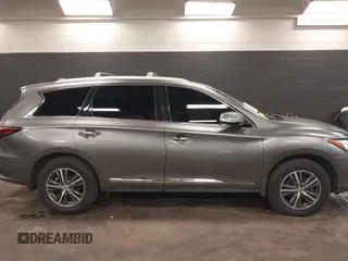 2016 Infiniti QX60 with VIN 5N1AL0MM1GC526389, listed as a IAAI auction lot 41704458 with 103,931 mi miles and . Bid and sale history available at DreamBid. Image 13.