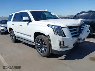 2016 Cadillac Escalade Luxury Collection with VIN 1GYS4BKJ1GR214364, listed as a IAAI auction lot 42107649 with 86,977 mi miles. Bid and sale history available at carsss.com. Image 1.