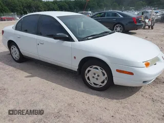 2001 Saturn SL z VIN 1G8ZK527X1Z258932, wystawiony jako IAAI lot #42722280 z przebiegiem 95 178 mil mil oraz . Historia ofert i sprzedaży dostępna na DreamBid. Obrazek 1.