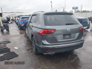2020 Volkswagen Tiguan SE with VIN 3VV3B7AX0LM121061, listed as a IAAI auction lot 41881541 with 60,315 mi miles and . Bid and sale history available at DreamBid. Image 3.