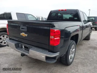 2015 Chevrolet Silverado 1500 LS with VIN 1GCRCPEH4FZ328290, listed as a IAAI auction lot 41584552 with 228,549 mi miles. Bid and sale history available at carsss.com. Image 4.