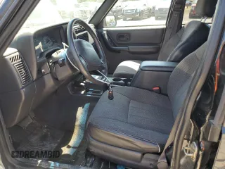 2000 Jeep Cherokee Classic with VIN 1J4FF58S4YL175741, listed as a Copart auction lot 60677205 with Not provided miles and Clean title. Bid and sale history available at DreamBid. Image 7.