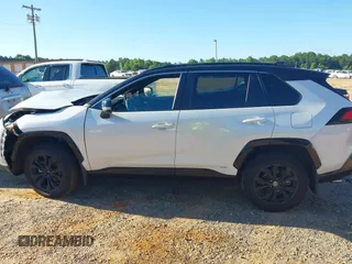 2023 Toyota RAV4 Hybrid XSE with VIN 2T3E6RFV1PW038080, listed as a IAAI auction lot 42518107 with 14,430 mi miles and . Bid and sale history available at DreamBid. Image 14.