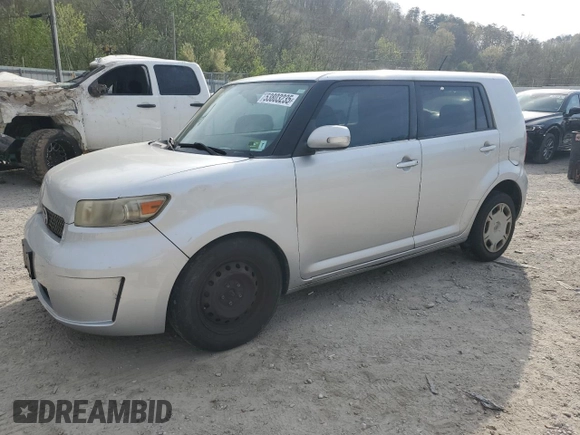 2009 Scion xB with VIN JTLKE50E691081245, listed as a Copart auction lot 53803235 with 243,395 mi miles and Salvage Title. Bid and sale history available at DreamBid. Image 1.