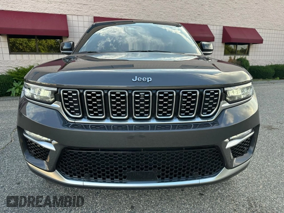 2023 Jeep Grand Cherokee Summit with VIN 1C4RJHEG2P8882566, listed as a Copart auction lot 65095905 with 59,970 mi miles and Salvage title. Bid and sale history available at DreamBid. Image 14.