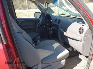 2005 Jeep Liberty Sport with VIN 1J4GL48K35W645419, listed as a IAAI auction lot 41823845 with 168,896 mi miles. Bid and sale history available at carsss.com. Image 5.