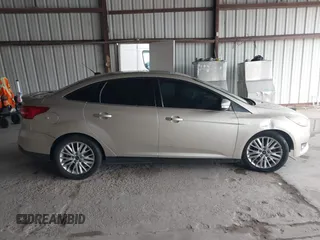 2017 Ford Focus Titanium with VIN 1FADP3J26HL279839, listed as a IAAI auction lot 42466826 with 202,795 mi miles and . Bid and sale history available at DreamBid. Image 13.