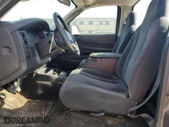 2003 Dodge Dakota with VIN 1D7FL16X13S189963, listed as a Copart auction lot 77114344 with 100,127 mi miles and Salvage Title. Bid and sale history available at carsss.com. Image 7.