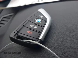2018 BMW X1 xDrive28i with VIN WBXHT3C36J5L32162, listed as a IAAI auction lot 41802315 with 80,422 mi miles. Bid and sale history available at carsss.com. Image 11.