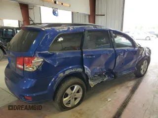 2012 Dodge Journey SXT with VIN 3C4PDDBG0CT260846, listed as a Copart auction lot 62384985 with 99,309 mi miles and Salvage title. Bid and sale history available at DreamBid. Image 3.