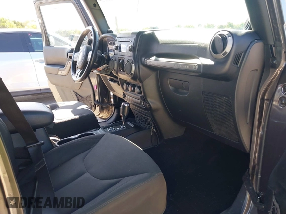 2014 Jeep Wrangler Unlimited Sport with VIN 1C4BJWDG4EL295044, listed as a IAAI auction lot 41997837 with 143,447 mi miles. Bid and sale history available at carsss.com. Image 5.