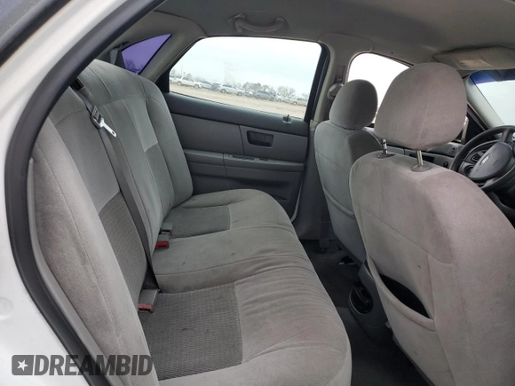 2005 Ford Taurus SE with VIN 1FAFP53255A165405, listed as a Copart auction lot 42693815 with 0 mi miles and Salvage Title. Bid and sale history available at carsss.com. Image 10.