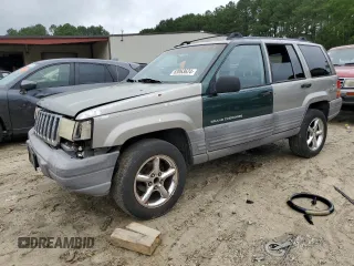 1998 Jeep Grand Cherokee Laredo with VIN 1J4FX58S7WC350624, listed as a Copart auction lot 63063624 with 0 mi miles and Salvage Title. Bid and sale history available at carsss.com. Image 1.