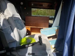 1995 Chevrolet Chevy Van с VIN 1GBEG25K1SF242663, выставлен на аукционе Copart как лот 56105615 с пробегом 140 366 миль миль и Чистый • Clean title. История ставок и продаж доступна на DreamBid. Изображение 11.