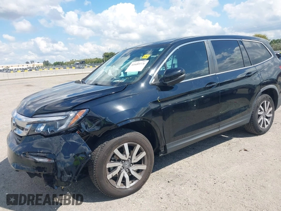 2020 Honda Pilot EX-L with VIN 5FNYF5H59LB014225, listed as a IAAI auction lot 41689776 with 90,994 mi miles. Bid and sale history available at carsss.com. Image 18.