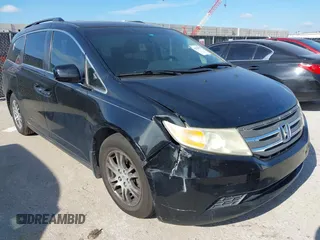 2012 Honda Odyssey EX-L z VIN 5FNRL5H63CB046447, wystawiony jako IAAI lot #42578775 z przebiegiem 247 852 mil mil oraz . Historia ofert i sprzedaży dostępna na DreamBid. Obrazek 6.