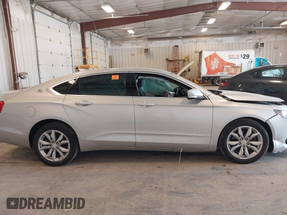 2017 Chevrolet Impala LT with VIN 2G1105SA0H9184020, listed as a IAAI auction lot 42484913 with Not provided miles and . Bid and sale history available at DreamBid. Image 13.