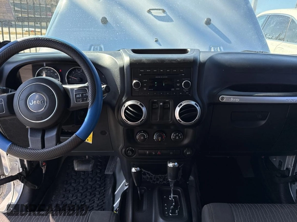 2012 Jeep Wrangler Arctic z VIN 1C4AJWBG2CL229572, wystawiony jako Copart lot #48719465 z przebiegiem 82 619 mil mil oraz Czysty tytuł • Clean title. Historia ofert i sprzedaży dostępna na DreamBid. Obrazek 9.