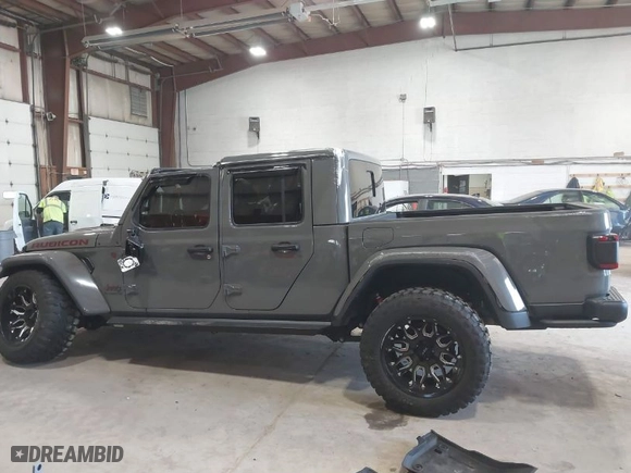 2020 Jeep Gladiator Rubicon with VIN 1C6JJTBG1LL214681, listed as a IAAI auction lot 41979666 with 23,811 mi miles. Bid and sale history available at carsss.com. Image 15.