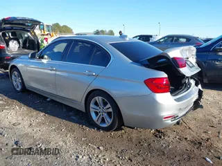 2018 BMW 3 Series 330i with VIN WBA8B9G58JNU97318, listed as a IAAI auction lot 41205434 with 62,582 mi miles and . Bid and sale history available at DreamBid. Image 3.