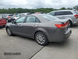 2012 Lincoln MKZ with VIN 3LNHL2JC1CR808663, listed as a Copart auction lot 61001675 with 153,627 mi miles and Salvage title. Bid and sale history available at DreamBid. Image 2.