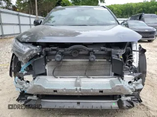 2023 Toyota RAV4 Hybrid XSE with VIN 4T3E6RFV1PU117863, listed as a Copart auction lot 60135555 with 28,248 mi miles and Salvage title. Bid and sale history available at DreamBid. Image 5.
