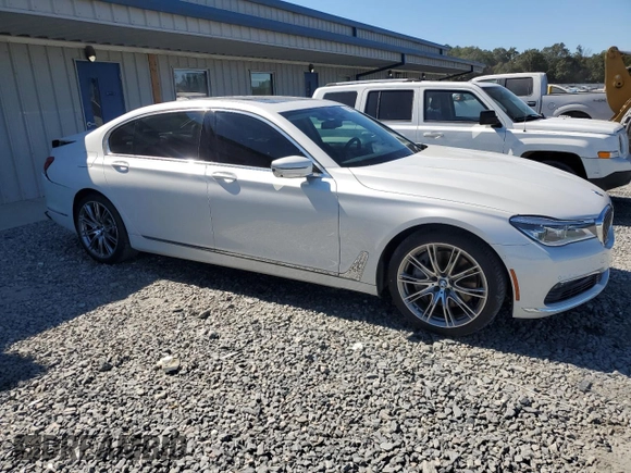 2016 BMW 7 Series 750i with VIN WBA7F0C56GGM20770, listed as a Copart auction lot 75985684 with 92,142 mi miles and Salvage Title. Bid and sale history available at carsss.com. Image 4.