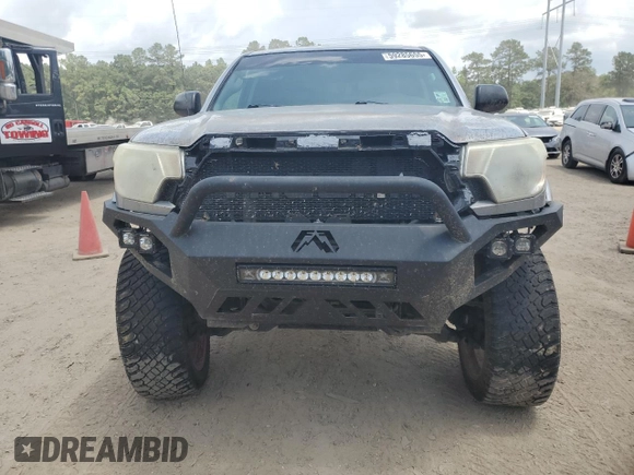 2015 Toyota Tacoma with VIN 5TFLU4EN5FX132006, listed as a Copart auction lot 59285655 with 205,932 mi miles and Salvage title. Bid and sale history available at DreamBid. Image 5.