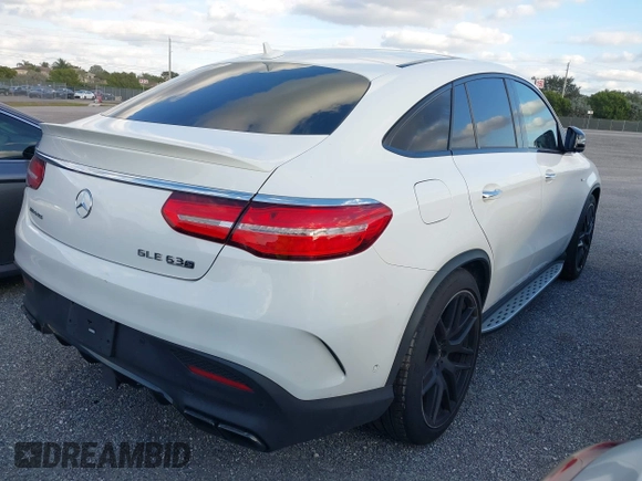 2018 Mercedes-Benz GLE 63 S AMG with VIN 4JGED7FB3JA099383, listed as a IAAI auction lot 41215972 with 44,057 mi miles and . Bid and sale history available at DreamBid. Image 4.