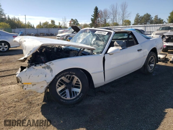 1988 Pontiac Firebird z VIN 1G2FS21S4JL245615, wystawiony jako Copart lot #73486314 z przebiegiem 144 774 mil mil oraz Czysty tytuł • Clean title. Historia ofert i sprzedaży dostępna na DreamBid. Obrazek 1.