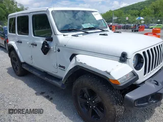 2021 Jeep Wrangler Unlimited Sahara with VIN 1C4HJXEN6MW764662, listed as a IAAI auction lot 42494617 with 81,954 mi miles and . Bid and sale history available at DreamBid. Image 1.