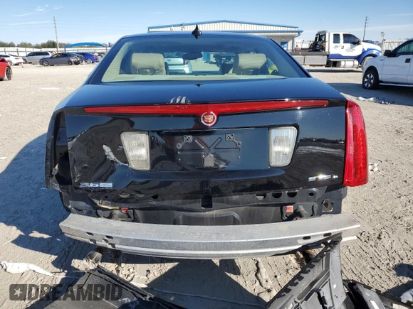 2009 Cadillac STS AWD z VIN 1G6DD67V690120833, wystawiony jako Copart lot #42502345 z przebiegiem 100 250 mil mil oraz Szkoda całkowita • Salvage title. Historia ofert i sprzedaży dostępna na DreamBid. Obrazek 6.