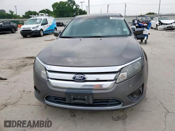 2012 Ford Fusion SE z VIN 3FAHP0HA9CR226737, wystawiony jako Copart lot #57229835 z przebiegiem 204 811 mil mil oraz Szkoda całkowita • Salvage title. Historia ofert i sprzedaży dostępna na DreamBid. Obrazek 5.