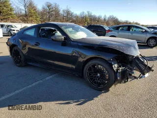 2025 BMW M4 Competition xDrive with VIN WBS33HK05SCT69107, listed as a Copart auction lot 80105324 with Not Provided miles and Salvage Title. Bid and sale history available at carsss.com. Image 4.