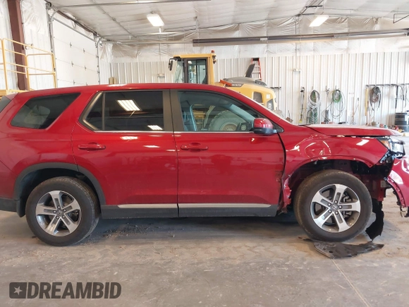 2023 Honda Pilot EX-L z VIN 5FNYG1H50PB019244, wystawiony jako IAAI lot #42091449 z przebiegiem 11 857 mil mil oraz . Historia ofert i sprzedaży dostępna na DreamBid. Obrazek 13.