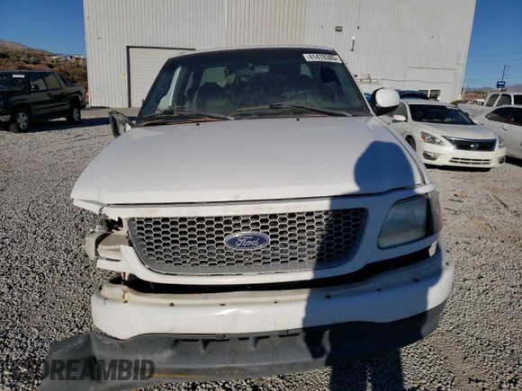 1999 Ford F-150 с VIN 1FTRX07W5XKB95198, выставлен на аукционе Copart как лот 41478385 с пробегом Не указан миль и Списание • Salvage title. История ставок и продаж доступна на DreamBid. Изображение 5.