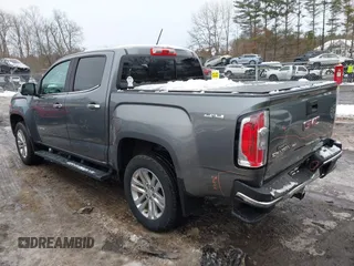 2018 GMC Canyon 4WD SLT with VIN 1GTG6DEN2J1301633, listed as a IAAI auction lot 41530624 with 98,771 mi miles. Bid and sale history available at carsss.com. Image 3.