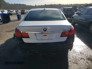 2013 BMW 7 Series 750i with VIN WBAYA8C55DC996693, listed as a Copart auction lot 80233423 with 140,925 mi miles and Salvage Title. Bid and sale history available at DreamBid. Image 6.