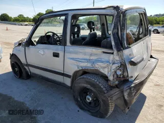 1991 Geo Tracker z VIN 2CNBJ18U3M6909006, wystawiony jako Copart lot #73638944 z przebiegiem 65 033 mil mil oraz Tytuł czysty. Historia ofert i sprzedaży dostępna na DreamBid. Obrazek 2.