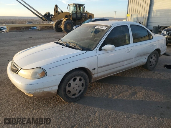 1999 Mercury Mystique GS z VIN 1MEFM6532XK638087, wystawiony jako Copart lot #85269414 z przebiegiem 192 506 mil mil oraz Szkody całkowita. Historia ofert i sprzedaży dostępna na DreamBid. Obrazek 1.